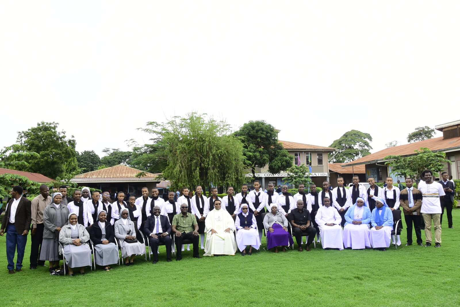 Students and school community members gathered on the campus lawn